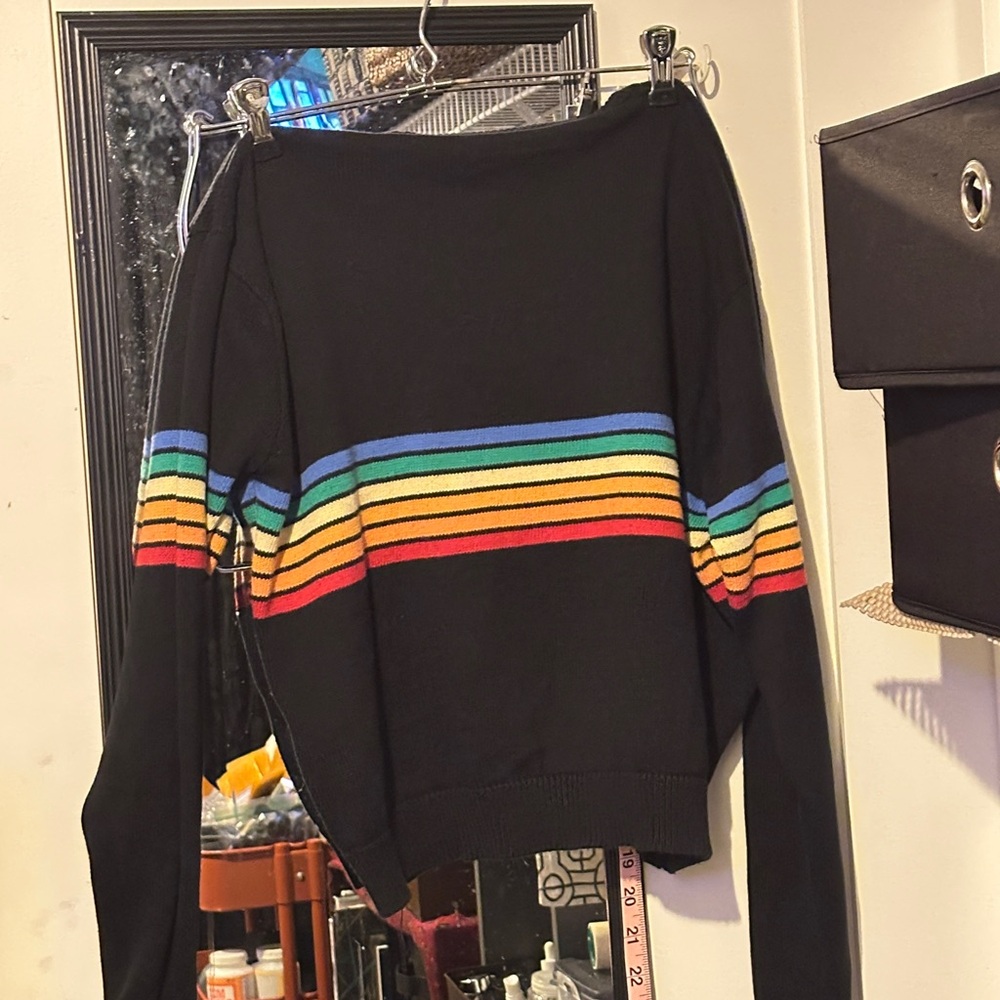 Black sweater with rainbow stripe